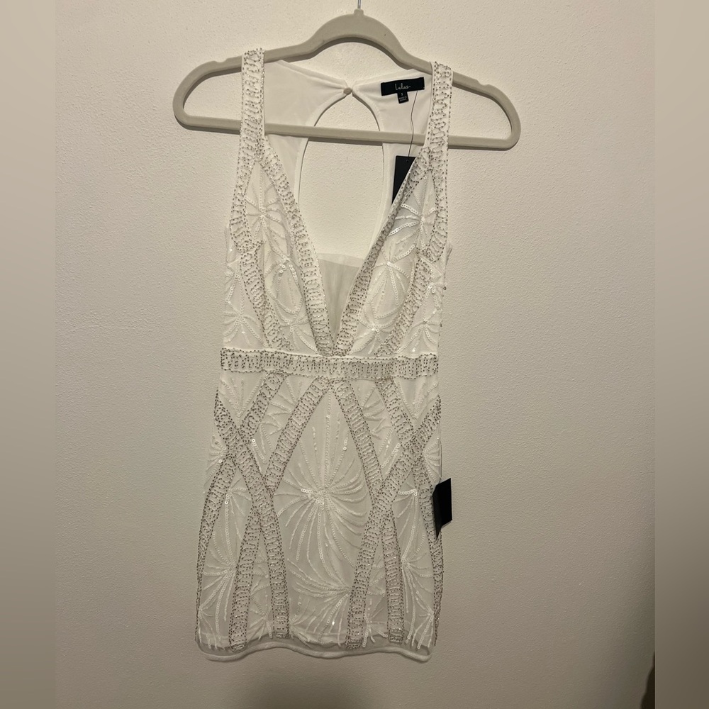 Keyhole back mini dress. New with tags